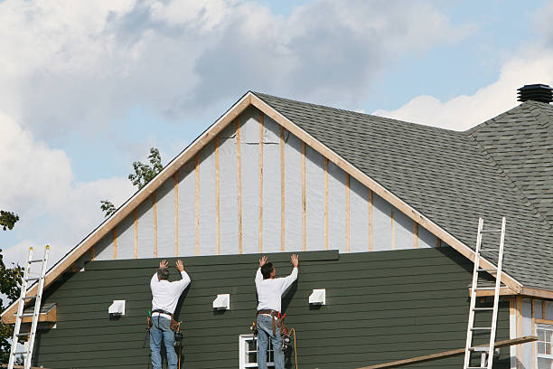 Professional Siding technician working in West Finley, PA